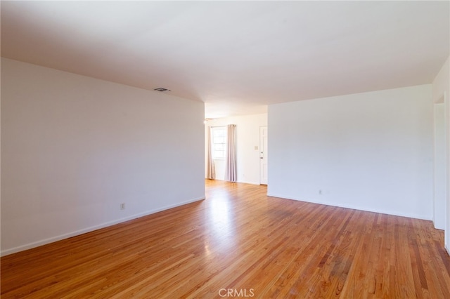10935 Nassau Ave, Sunland, CA 91040 - empty room featuring light wood finished floors and baseboards