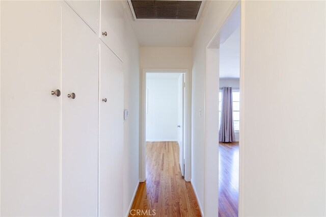 10935 Nassau Ave, Sunland, CA 91040 - hall featuring light wood finished floors and baseboards