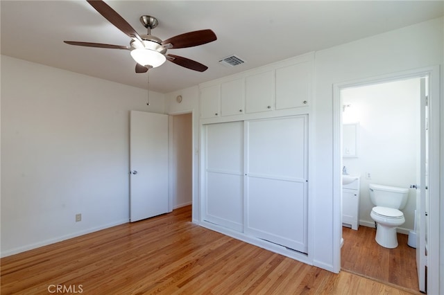 10935 Nassau Ave, Sunland, CA 91040 - unfurnished bedroom with light wood finished floors, a closet, ensuite bathroom, and ceiling fan