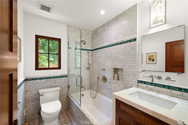 750 Manzanita Dr, Laguna Beach, CA 92651 - full bath with tile walls, vanity, tiled shower / bath combo, and recessed lighting