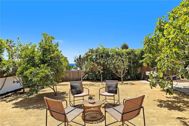 750 Manzanita Dr, Laguna Beach, CA 92651 - fenced backyard with a patio area