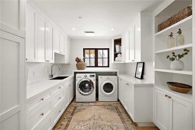 750 Manzanita Dr, Laguna Beach, CA 92651 - laundry room featuring cabinet space, washer and clothes dryer, and recessed lighting