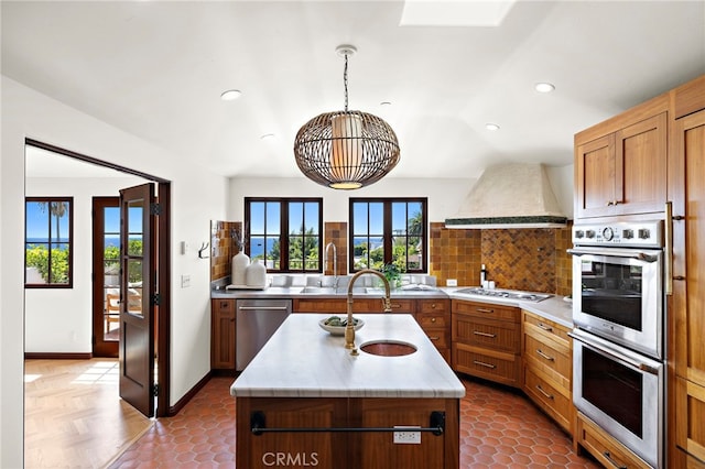 750 Manzanita Dr, Laguna Beach, CA 92651 - kitchen featuring stainless steel appliances, custom range hood, light countertops, backsplash, and recessed lighting