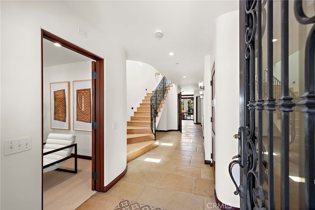 750 Manzanita Dr, Laguna Beach, CA 92651 - entrance foyer featuring stairway, recessed lighting, and stone tile floors