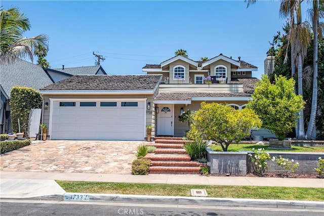 1733 Bayou Way, Seal Beach, CA 90740 - view of front of property featuring a garage and decorative driveway