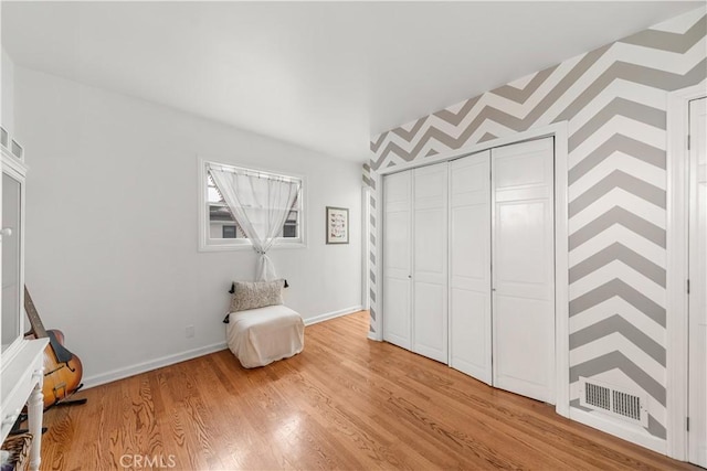 1733 Bayou Way, Seal Beach, CA 90740 - living area featuring light wood-type flooring and baseboards