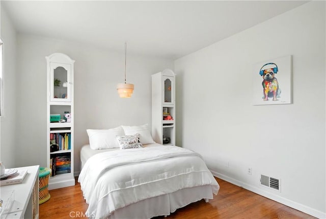 1733 Bayou Way, Seal Beach, CA 90740 - bedroom featuring wood finished floors and baseboards
