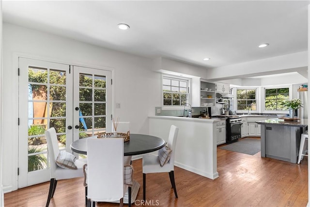 1733 Bayou Way, Seal Beach, CA 90740 - dining room with french doors, wood finished floors, and recessed lighting