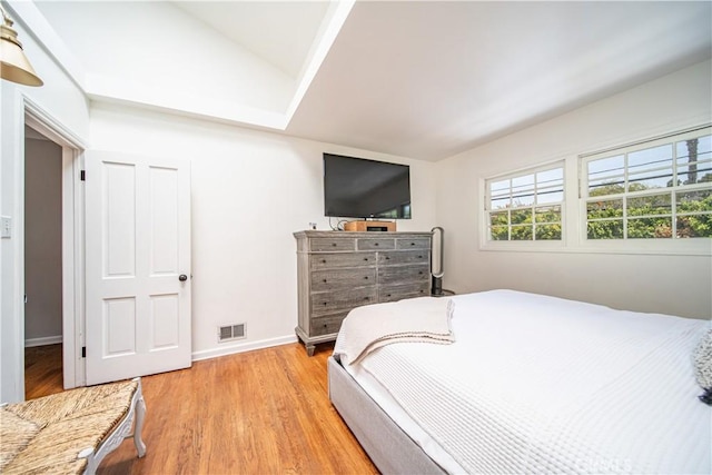 1733 Bayou Way, Seal Beach, CA 90740 - bedroom featuring vaulted ceiling and light wood-style flooring