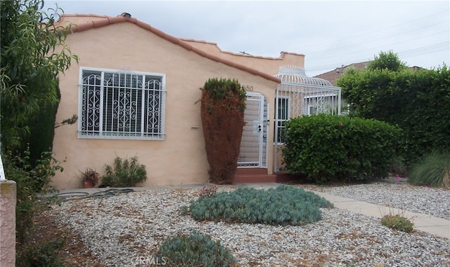 650 W 111th St, Los Angeles, CA 90044 - view of front of home with stucco siding