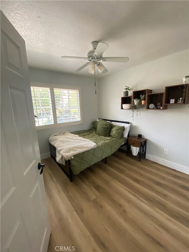2304 Trickling Creek Dr, La Verne, CA 91750 - bedroom with wood finished floors and a ceiling fan