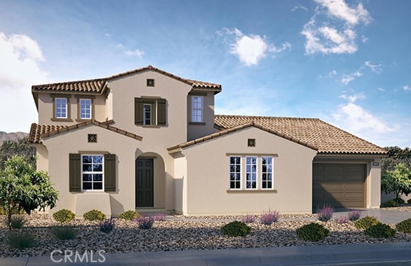 18409 Park Mountain Dr, Riverside, CA 92508 - mediterranean / spanish house featuring a tiled roof, stucco siding, an attached garage, and driveway