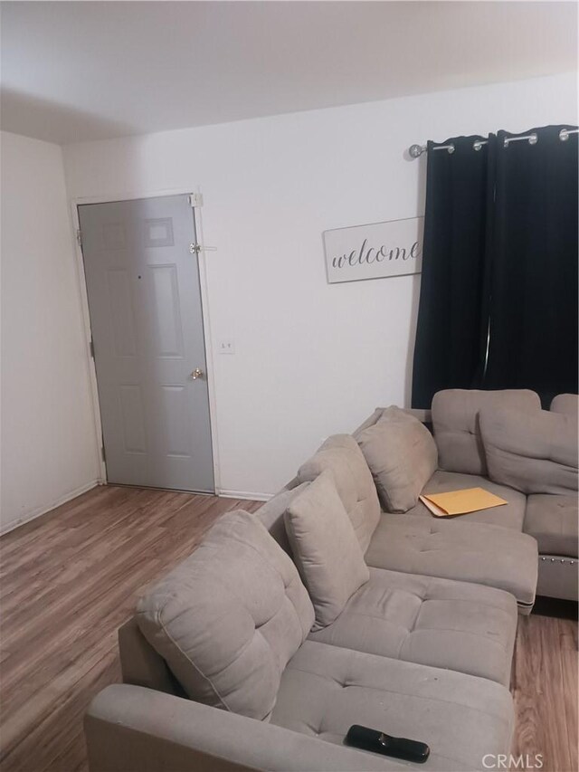 12218 Orchid Ln Unit A, Moreno Valley, CA 92557 - living area featuring wood finished floors