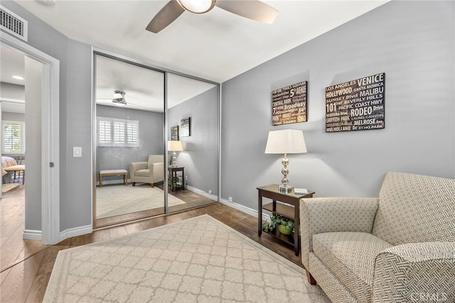199 N Magnolia Ave Unit D, Anaheim, CA 92801 - living area with ceiling fan, wood finished floors, and plenty of natural light