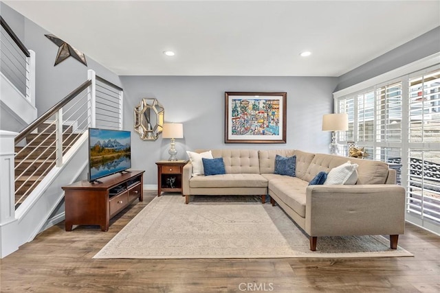 199 N Magnolia Ave Unit D, Anaheim, CA 92801 - living area featuring stairs, wood finished floors, and recessed lighting