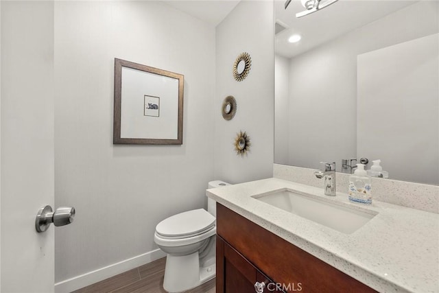 199 N Magnolia Ave Unit D, Anaheim, CA 92801 - half bathroom with vanity and wood finished floors