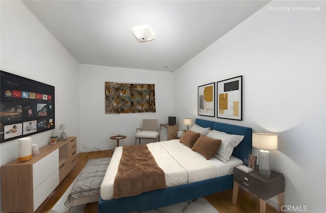 5064 N Berkeley Ave, San Bernardino, CA 92407 - bedroom featuring wood finished floors