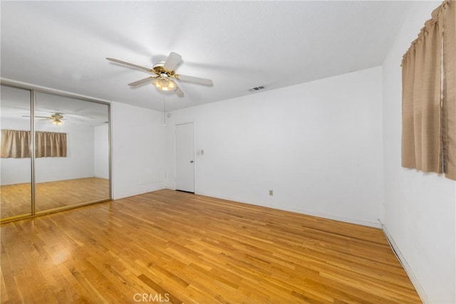 5064 N Berkeley Ave, San Bernardino, CA 92407 - unfurnished bedroom with light wood finished floors and ceiling fan