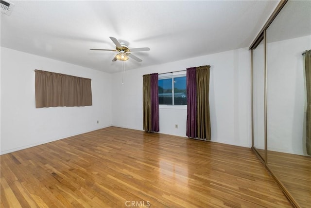 5064 N Berkeley Ave, San Bernardino, CA 92407 - spare room featuring a ceiling fan and light wood-type flooring