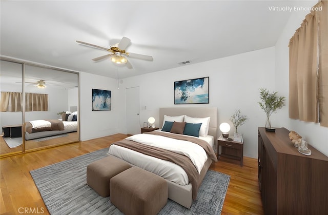 5064 N Berkeley Ave, San Bernardino, CA 92407 - bedroom with light wood-style flooring, ceiling fan, and a closet