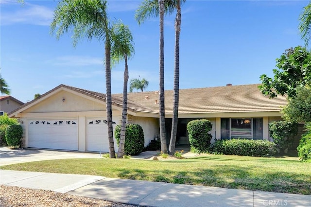 872 Deborah St, Upland, CA 91784 - ranch-style house with stucco siding, an attached garage, concrete driveway, a front yard, and a tile roof