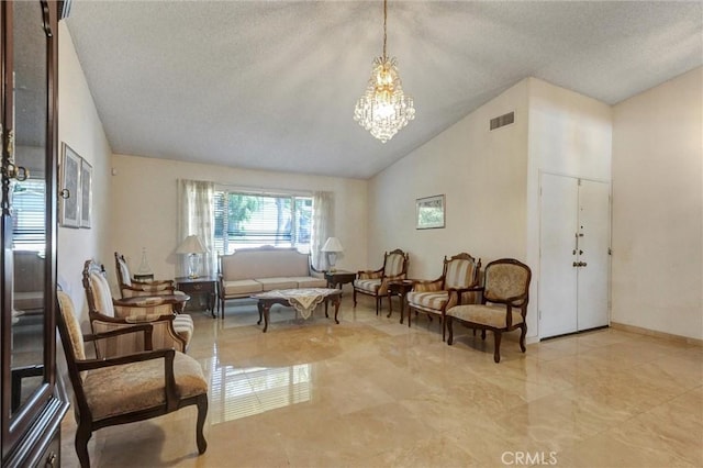 872 Deborah St, Upland, CA 91784 - living area with lofted ceiling, a textured ceiling, and a chandelier