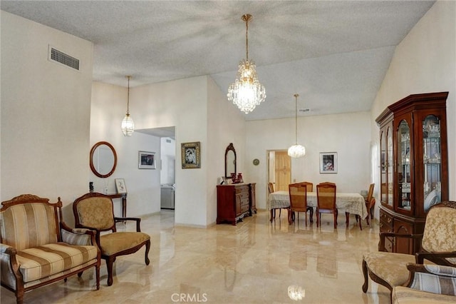 872 Deborah St, Upland, CA 91784 - living room with a chandelier, high vaulted ceiling, light marble finish floors, and a textured ceiling