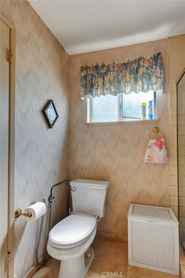 872 Deborah St, Upland, CA 91784 - bathroom with tiled shower, tile patterned flooring, and wallpapered walls