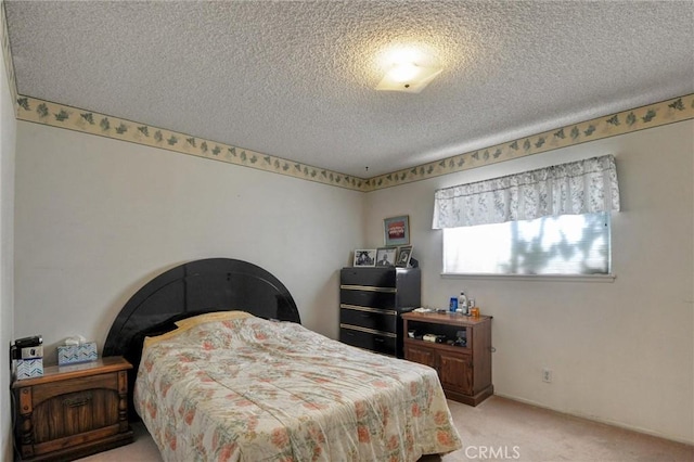 872 Deborah St, Upland, CA 91784 - bedroom featuring light carpet and a textured ceiling