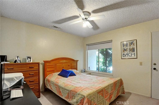 872 Deborah St, Upland, CA 91784 - bedroom featuring light carpet, a textured ceiling, and a ceiling fan