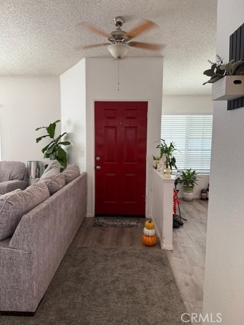 12446 Mount Baldy Dr, Victorville, CA 92392 - view of exterior entry featuring ceiling fan and outdoor lounge area