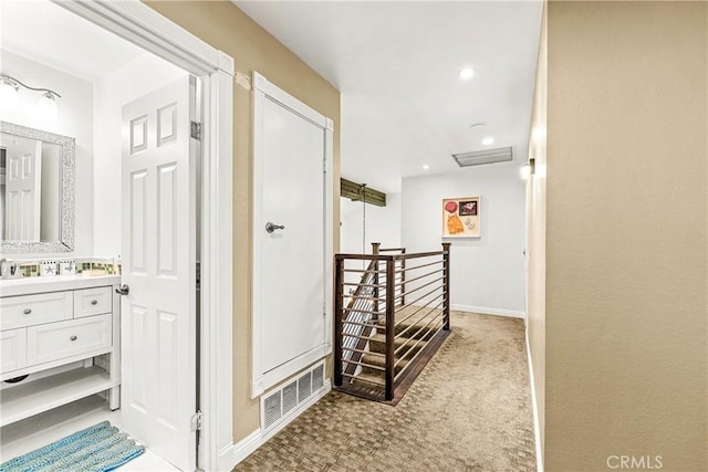 2040 Cape Cod Ct, Claremont, CA 91711 - hall with an upstairs landing, carpet, and recessed lighting