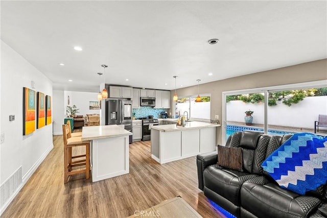 2040 Cape Cod Ct, Claremont, CA 91711 - living area featuring light wood-style floors and recessed lighting