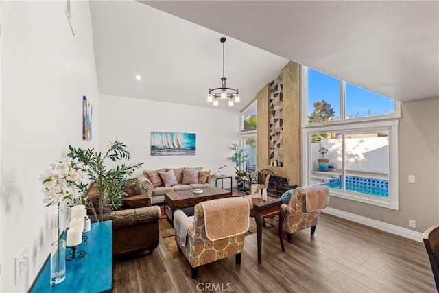 2040 Cape Cod Ct, Claremont, CA 91711 - living room with wood finished floors, a chandelier, and vaulted ceiling