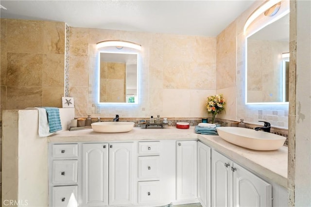 2040 Cape Cod Ct, Claremont, CA 91711 - bathroom featuring tile walls, backsplash, and double vanity