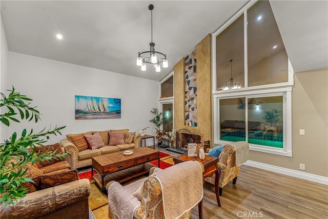 2040 Cape Cod Ct, Claremont, CA 91711 - living room featuring a chandelier, wood finished floors, recessed lighting, and vaulted ceiling