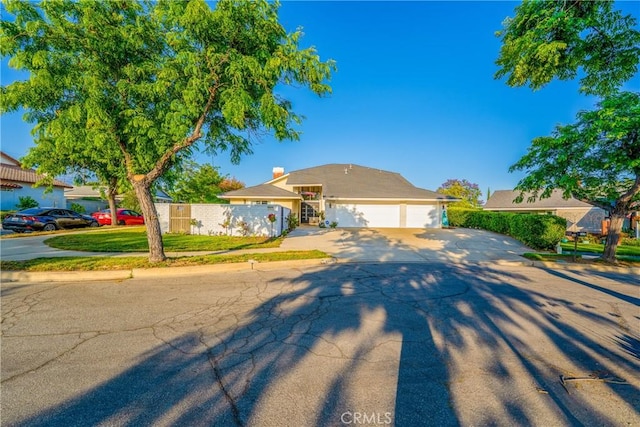 2040 Cape Cod Ct, Claremont, CA 91711 - view of front facade with driveway and a garage
