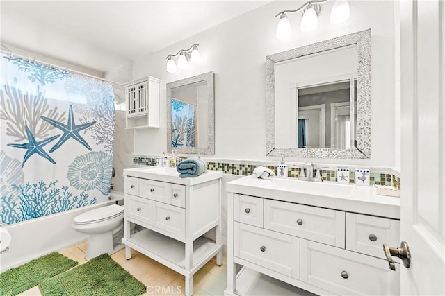 2040 Cape Cod Ct, Claremont, CA 91711 - bathroom featuring shower / tub combo, two vanities, tile patterned flooring, tile walls, and a wainscoted wall