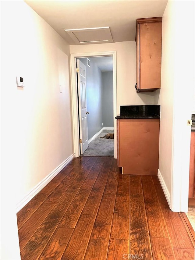 8049 Le Berthon St, Sunland, CA 91040 - hallway with attic access and dark wood-type flooring