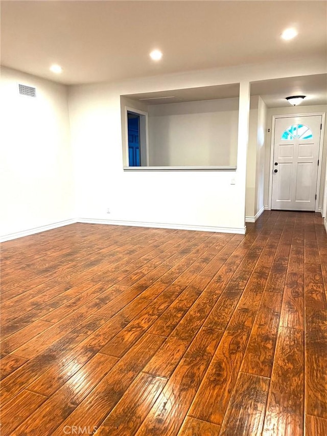 8049 Le Berthon St, Sunland, CA 91040 - empty room featuring dark wood-style flooring and recessed lighting