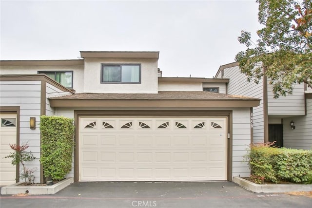 8458 Evergreen, Garden Grove, CA 92841 - view of front facade with a garage and driveway