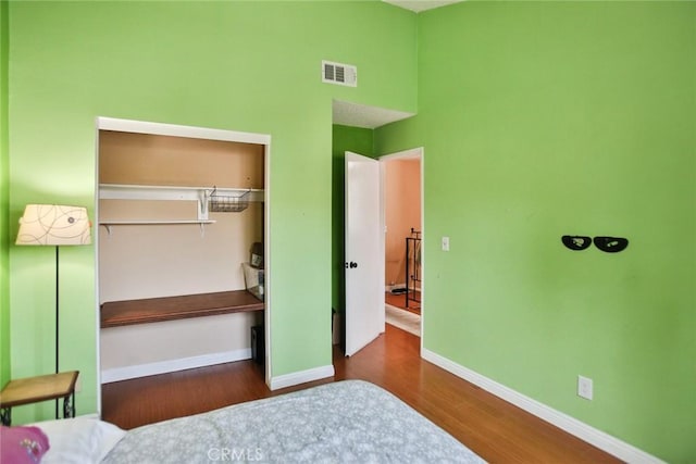 8458 Evergreen, Garden Grove, CA 92841 - bedroom featuring wood finished floors and a closet