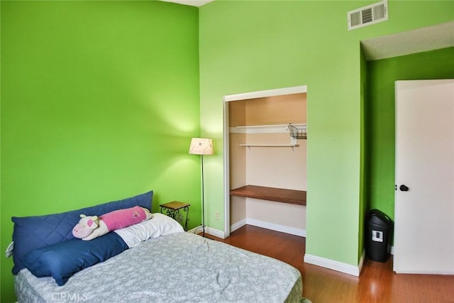 8458 Evergreen, Garden Grove, CA 92841 - bedroom with wood finished floors and a closet