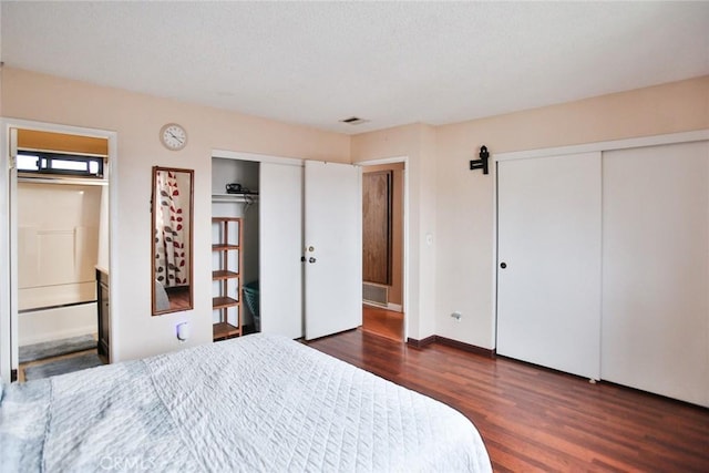 8458 Evergreen, Garden Grove, CA 92841 - bedroom with multiple closets, wood finished floors, and ensuite bathroom