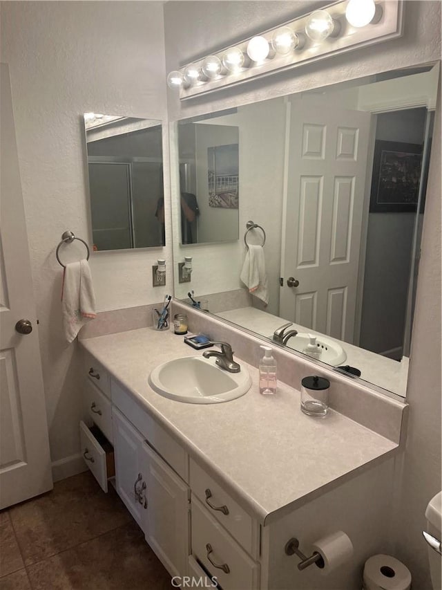 9849 Canada Way, Riverside, CA 92503 - bathroom featuring vanity and tile patterned flooring