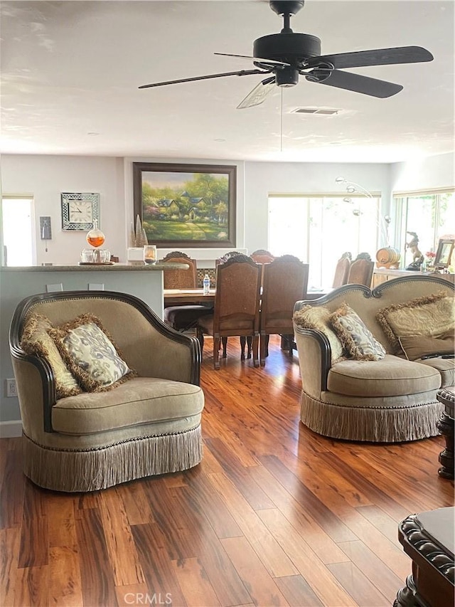 9849 Canada Way, Riverside, CA 92503 - living area with a ceiling fan and wood finished floors