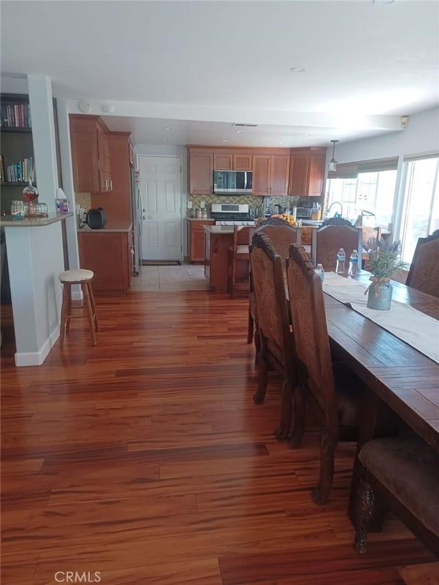 9849 Canada Way, Riverside, CA 92503 - dining area featuring light wood-style floors