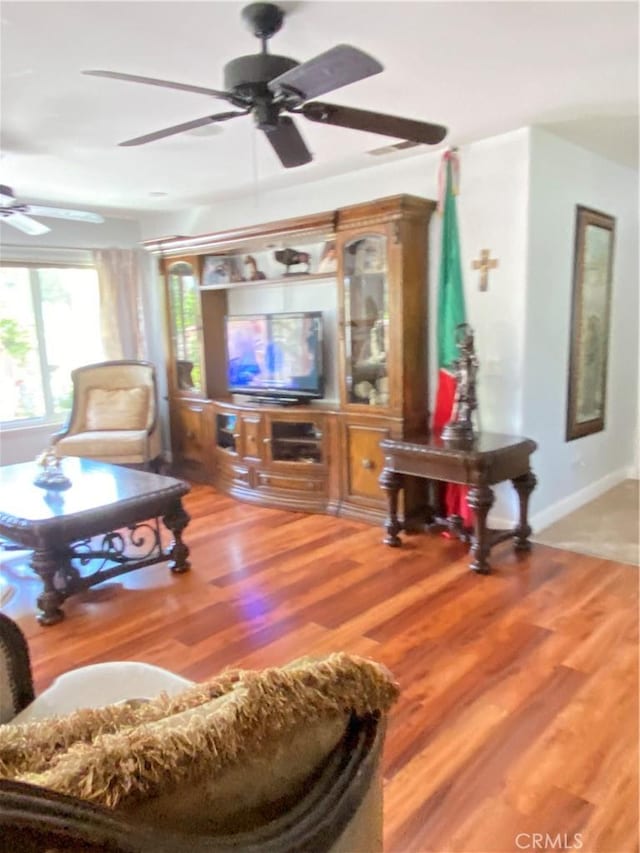 9849 Canada Way, Riverside, CA 92503 - living room with ceiling fan and light wood-style floors
