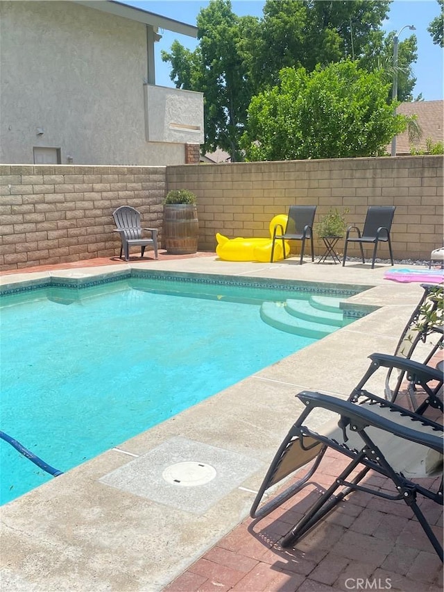 9849 Canada Way, Riverside, CA 92503 - view of pool featuring a patio area