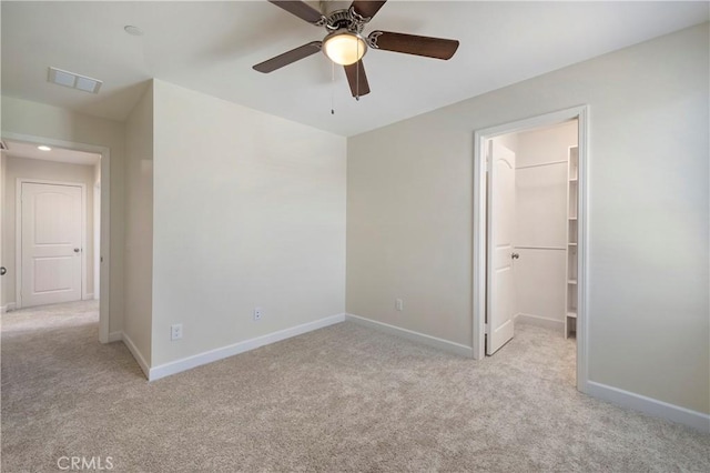 30316 Slate St, Murrieta, CA 92563 - unfurnished bedroom featuring carpet floors, a spacious closet, a closet, and ceiling fan